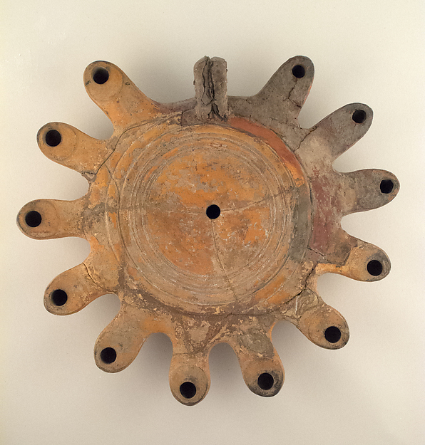 Terracotta lamp with multiple nozzles and ring handle by an unrecorded maker, The Metropolitan Museum of Art