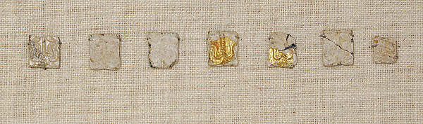 Glass ornaments with gold leaf overlay