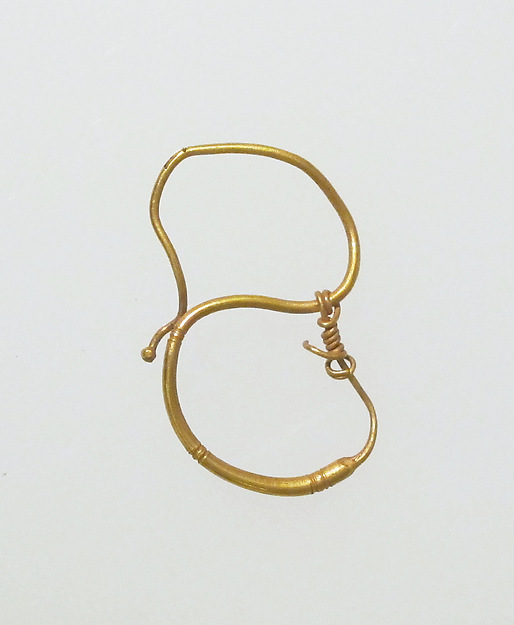 Earring, delta-shaped
