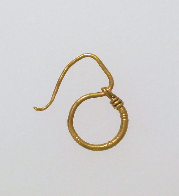 Earring, delta-shaped