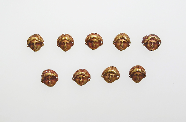 Appliques in the form of female head