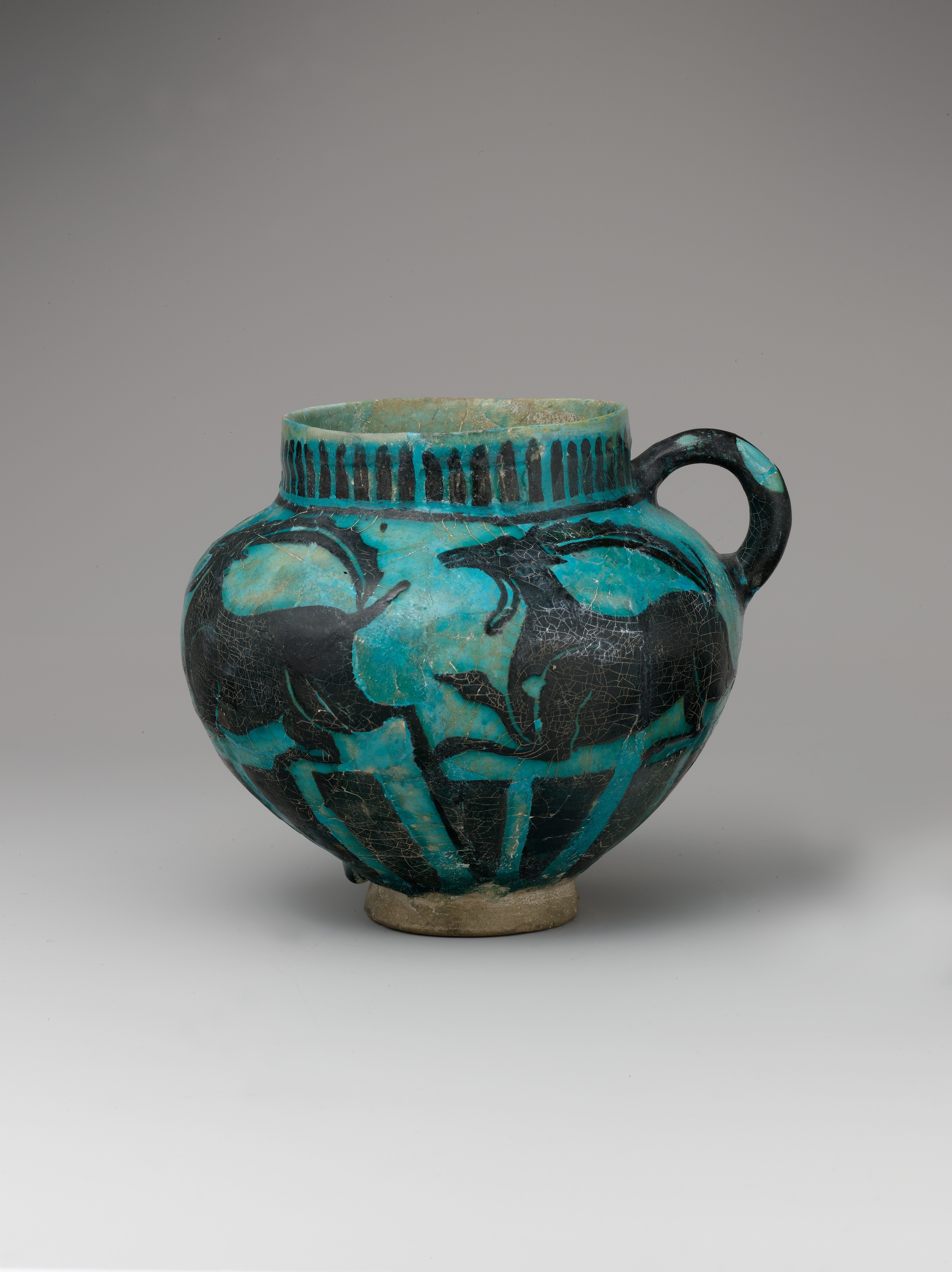 Cup with Running Ibexes, Stonepaste; incised decoration through black slip ground under turquoise glaze (