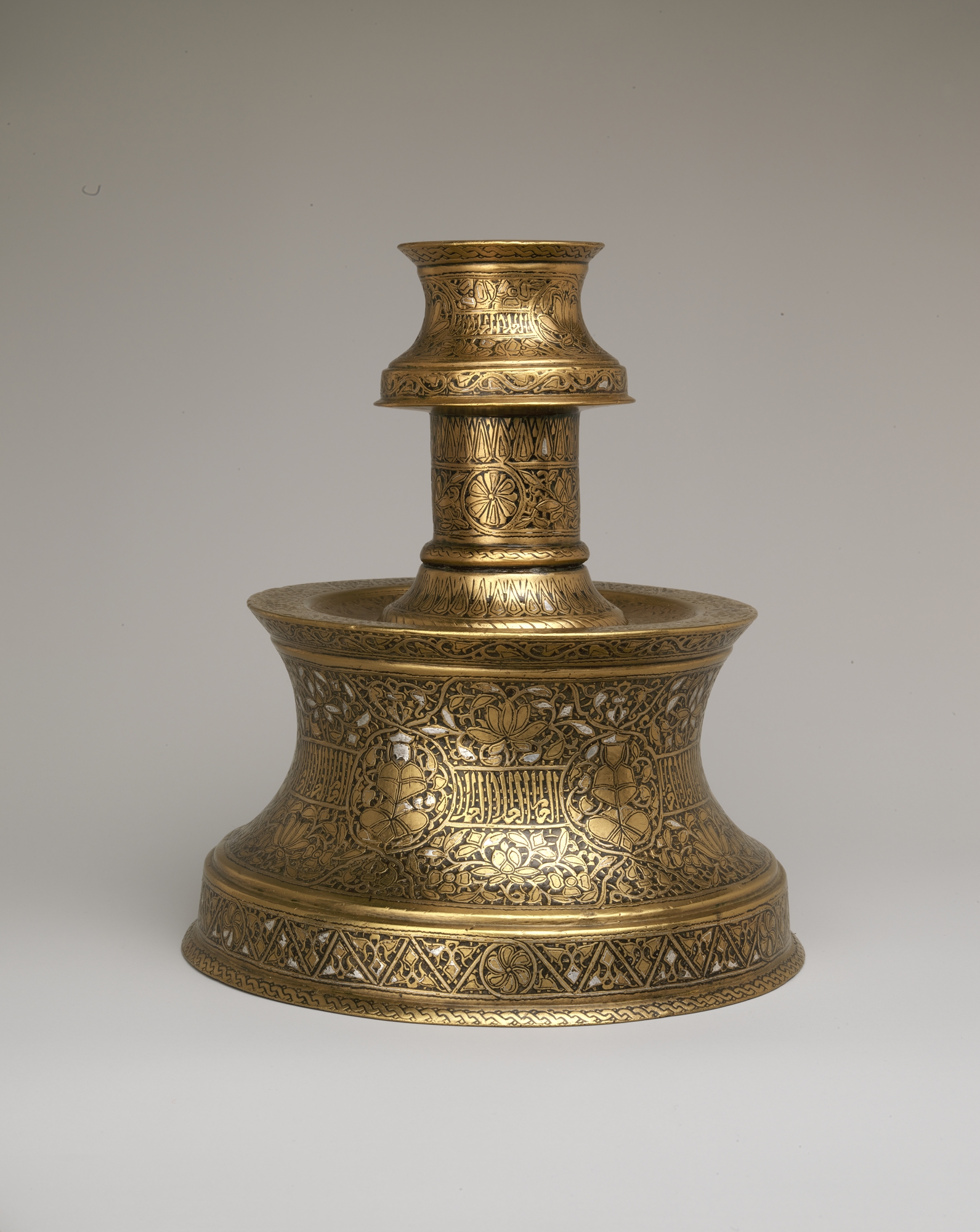 Candlestick with Repeating Seated Figure, Inscription, and Flowers ...