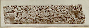 Panel with Animals Flanking a Vase Against a Pattern of Scrolls, Limestone; carved in relief