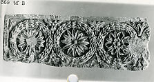Fragment of a Frieze with a Sequence of Roundels Enclosing Rosettes, Limestone; carved in relief