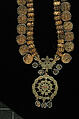 Necklace, Gold, diamonds, colorless sapphires, rubies, imitation emeralds (colorless rock crystal over green foil), and pearls