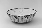Bowl with Rosette, Earthenware; white slip with polychrome slip decoration under transparent glaze