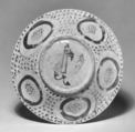 Bowl depicting a Man holding a Cup and a Flowering Branch, Earthenware; luster-painted on opaque white glaze