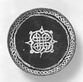 Bowl with Knotted Medallion, Earthenware; black slip with white slip decoration under transparent glaze