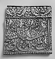 Tile From an Inscriptional Frieze, Stonepaste; underglaze painted in blue, luster-painted on opaque white ground, modeled