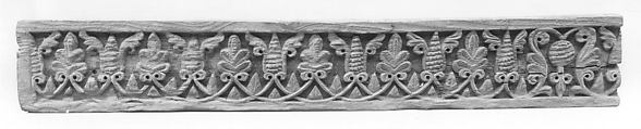 Fragment of a Frieze with Winged Pinecones and Palmettes, Wood; carved