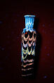 Cosmetic Flask, Glass, amber; blown with applied marvered opaque white decoration