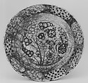 Dish, Stonepaste; underglaze painted in black, blue, and green with red and yellow slips