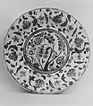 Plate, Stonepaste; underglaze painted in black, blue, and green with red and yellow slips