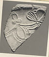Fragment of a Dish, Earthenware; white engobe, splashed green glaze and what appears to be a spot of gold luster, molded decoration