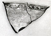 Ceramic Fragment, Earthenware; gritty white body, blue decoration, glazed