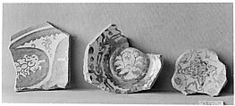 Fragment of a Bowl, Reddish earthenware; white slip; blue under transparent, colorless glaze; luster paint