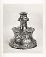 Candlestick with Repeating Seated Figure, Inscription, and Flowers, Brass; cast, engraved, and originally inlaid with silver