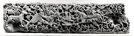 Panel with Animals Flanking a Vase Against a Pattern of Scrolls, Limestone; carved in relief