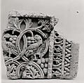 Fragment from a Two-Sided Sanctuary Screen with Birds Eating Grapes, Limestone, red pigment; carved in relief