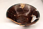 Bowl, Earthenware; brown slip under transparent glaze