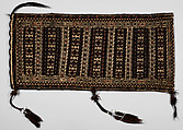 Saddle Bag, Loom-woven flat weave cloth in wool folded and joined at the sides with overcast stitches faces of different pattern; decorated with braids