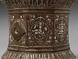 Mortar and Pestle made for Abu Bakr 'Ali Malikzad al-Tabrizi, Bronze; inlaid with silver and black compound