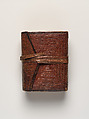 Qur'an, Ink and opaque watercolor on paper; embossed leather cover