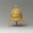 Goa Stone and Gold Case, Container: gold; pierced, repoussé, with cast legs and finials
Goa stone: compound of organic and inorganic materials