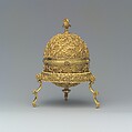 Goa Stone and Gold Case, Container: gold; pierced, repoussé, with cast legs and finials
Goa stone: compound of organic and inorganic materials