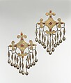 Pectoral Disc Ornament, One of a Pair, Silver; fire-gilded with stamped bead and twisted wired decoration, engraving/punching and openwork decoration and table cut carnelian