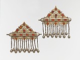 Triangular Amulet Holder, One of a Pair, Silver, fire gilded and engraved/punched decoration and table cut carnelians, silver link chains and bells/beads.