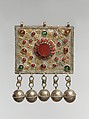 Front Panel of an Amulet Holder, Silver, with decorative wire, gilt applied decoration, chains, bells, table-cut carnelian, coral beads, and glass stones