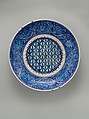 Dish, Stonepaste; painted in turquoise and two hues of blue under transparent glaze