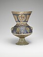 Mosque lamp, Glass, colorless with brownish tinge; free blown; enameled with red, blue, white, yellow, and green; gilded; six loops for suspension and foot attached.
