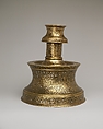 Candlestick with Repeating Seated Figure, Inscription, and Flowers, Brass; cast, engraved, and originally inlaid with silver