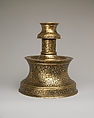 Candlestick with Repeating Seated Figure, Inscription, and Flowers, Brass; cast, engraved, and originally inlaid with silver