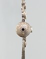 Triangular Amulet Holder, Silver; with twisted wire chains and bells, chased and embossed decoration, and table-cut cut carnelians