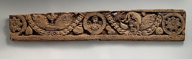 Fragment of a Frieze with Winged Pinecones and Palmettes, Wood; carved