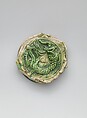 Fragment of an Imported Chinese Bowl, Earthenware; applied relief medallion under three color (sancai) glaze