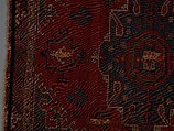 Tribal Carpet with Medallion Design, Wool (warp, weft, and pile); symmetrically knotted pile