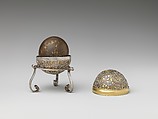 Bezoar Stone with Case and Stand, Container: silver; pierced, chased, and mercury-gilded
Goa stone: compound of organic and inorganic materials; mercury-gilded