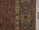 Carpet, Cotton (warp and weft), wool (pile); asymmetrically knotted pile 