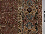 Carpet, Cotton (warp and weft), wool (pile); asymmetrically knotted pile 