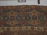 Carpet, Cotton (warp and weft), wool (pile); asymmetrically knotted pile 