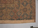 Carpet, Cotton (warp and weft), wool (pile); asymmetrically knotted pile 