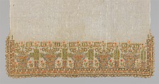 Gold Bordered Napkin with Pavillions, Cotton; embroidered in gold and silver metal wrapped thread