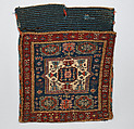 Face of Half a Double Saddle Bag (Khorjin), Wool (warp, ground weft, and sumak weft); sumak extra-weft wrapping (front); weft-faced plain weave (back)