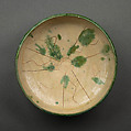 Bowl, Earthenware; slip covered with monochrome pigments under transparent glaze, incised