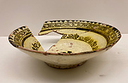 Bowl, Earthenware; white slip under clear yellow glaze